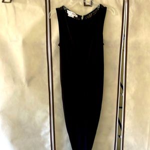 Black slightly fitted lace back detail dress